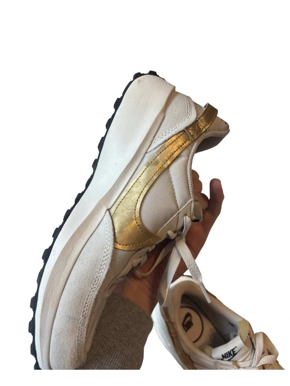 Nike Waffle Debut sneakers in a light orewood brown and metallic gold colorway